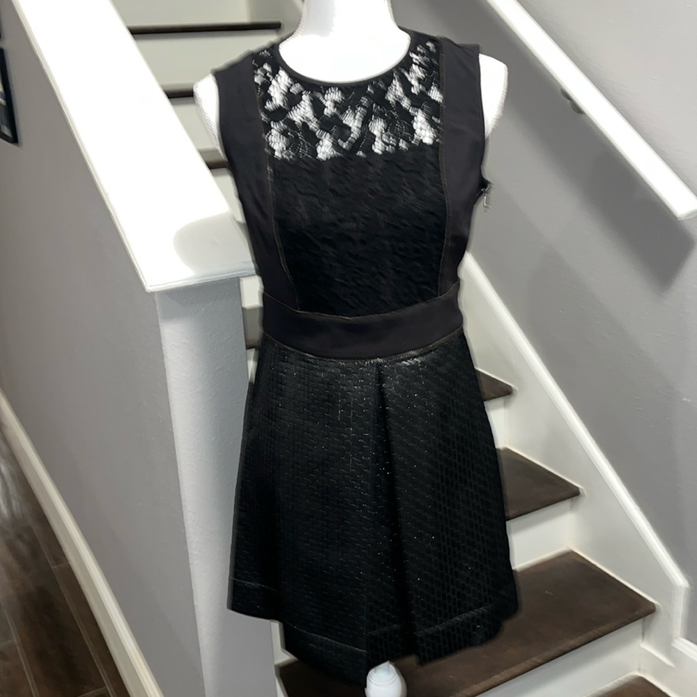 Rachel Roy never worn Black Ultra Stylish dress. Faux leather skirt lace top 12